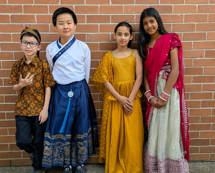 Children wearing tradition and cultural clothes for Multicultural Day.