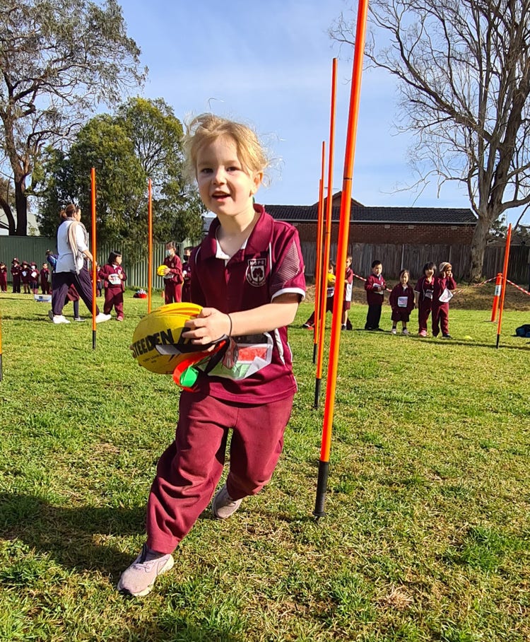 A child running with a ball