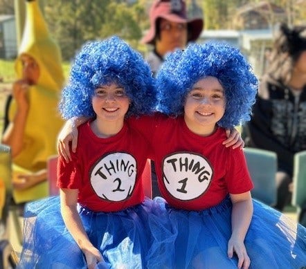 Two children dressed up in costumes for Book Week
