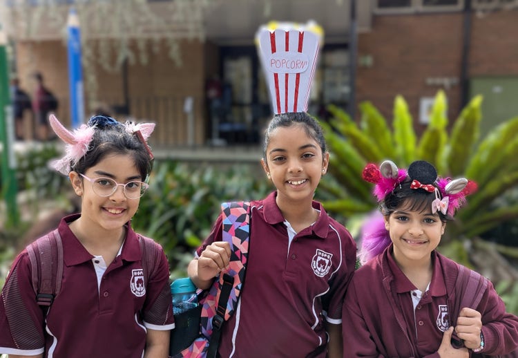 Students wearing crazy hair for the Easter Hat Parade