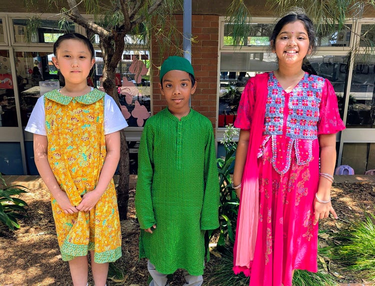 Students wearing traditional and cultural outfits